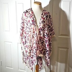 Candor floral with crochet trim shawl. Pinks, purple and burgundy.
